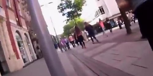 Shy girl tries to pull hot pants down