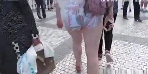 Girl with a big ass in tight shorts