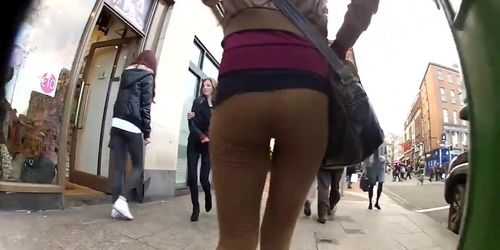 Two petite teens walking in tight leggings