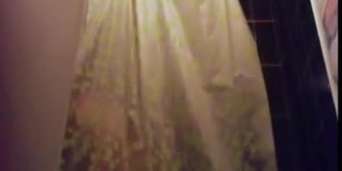 23 yo brunette with huge boobs caught by spy cam in shower