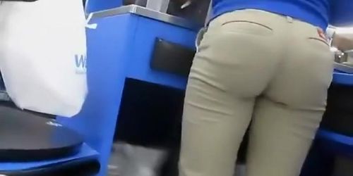 Hot butt of a cash register lady is filmed