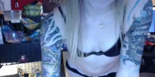 Blonde flashes her boobs at home