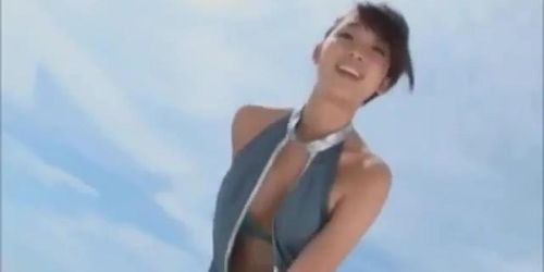 Sweet Japanese girl dancing on the beach (Non-Nude)