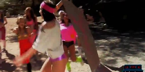 Busty college teens at camp doing topless aerobics