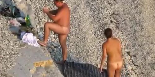 Nude beach blowjob voyeur style