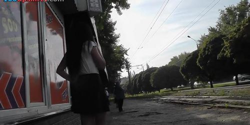 Smoking brunette chick caught on the upskirt camera