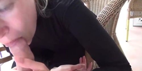 Sexy girl suck cock passionately on the balcony