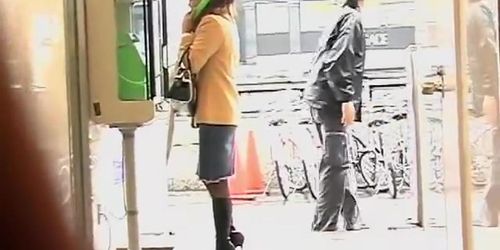 Pay phone sharking action with glamorous Japanese girl being really surprised