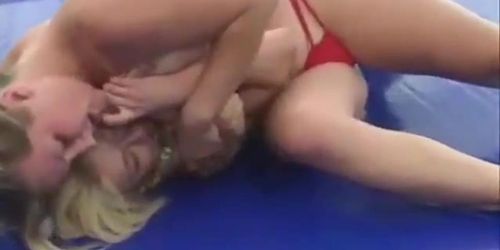 Muscle girl dominated in wrestling