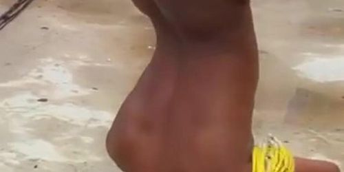 Black Woman Dancing nude in at a Festival