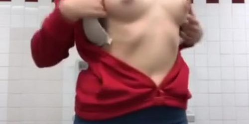 Caught flashing perky boobs in bathroom