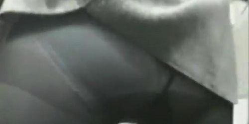 Nice asian woman is caught on camera while pissing in toilet