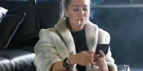 Smoking Fetish with hot blond and a fur coat