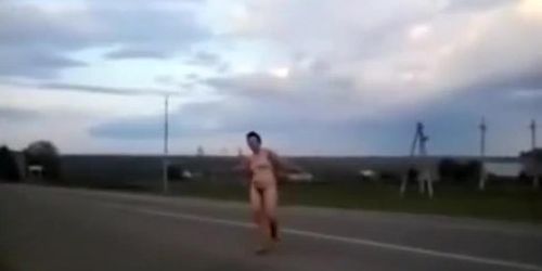 Mature drunk woman walking naked