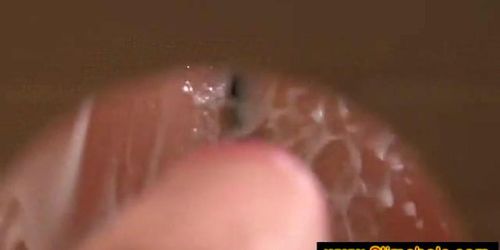 Brunette rubing it against a glory hole