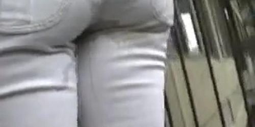 Pissing : mandy wetting her panties & pants outside