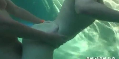 Redhead hottie having underwater sex for cash