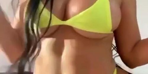 cute latin girl moving body sexy and slow with music