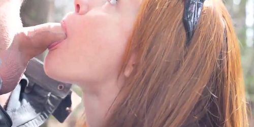 Sexy redhead blowjob and swallow in the woods