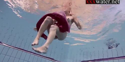 Smoking hot Russian redhead in the pool