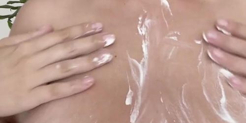 MG rubbing big boobs with cream.  NO NAMES PLEASE