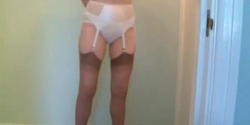mature leggy lady undresses on camera