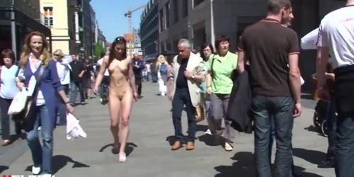 Nude in the middle of the Crowded street