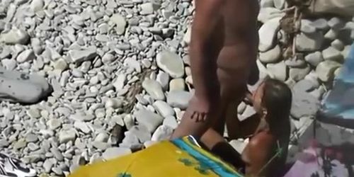 Nudist blows her standing man's penis