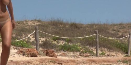 Topless teen on the beach 4 part 2