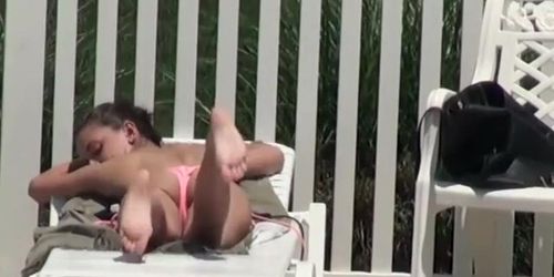 Voyeur spies a girl by the swimming pool (Playful Feet)