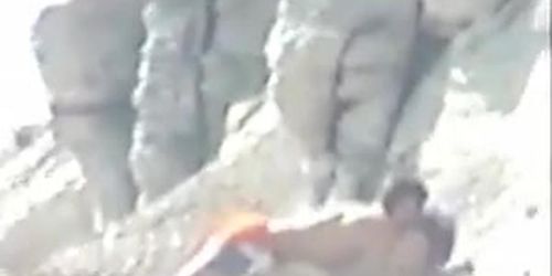 Shy couple caught on the nudist beach