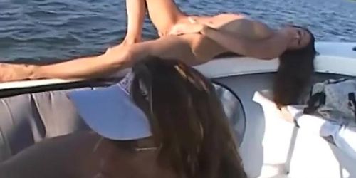 Naughty blonde and her gf share a cock while on a boat