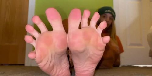 Mixed girl shows her soles