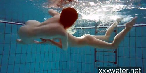 Milana and Katrin strip eachother underwater (Anna Smart)