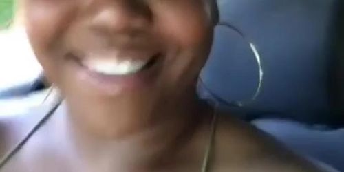 Big sexy black woman shows off Enormous breasts