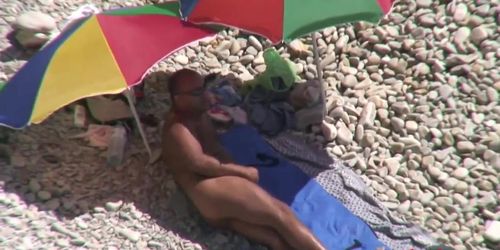 Horny nudists caught having sex on voyeur beach