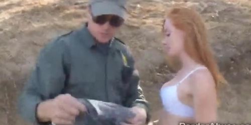 Border officer welcomes a teen redhead immigrant