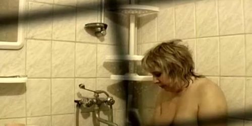 Fat woman in bathtub masturbating and shower