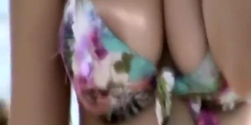 Sweet nipple slip on the beach