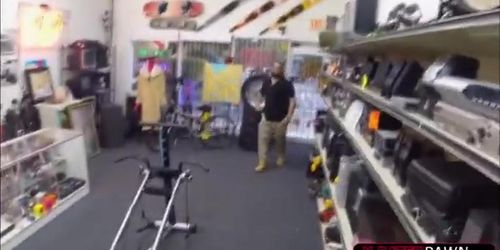 New definition of exercise by fit woman at pawnshop for pawning lifting set