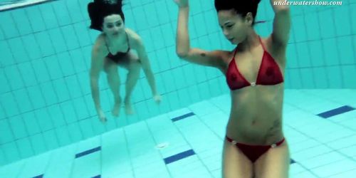 Nina Markova and Zlata Oduvanchik swimming naked in the pool