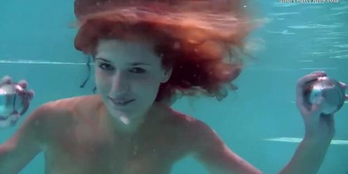 Sexy underwater redhead Nikita Vodorezova