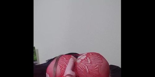 Watch nasty Susi lying on back playing with toy between tits