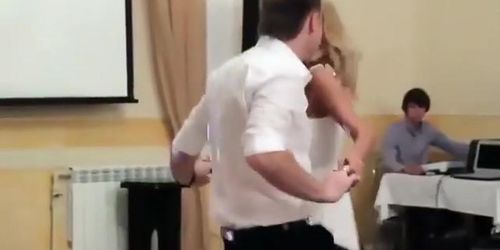 Peeking up her skirt during a dance