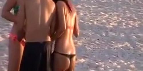 A Hot Chick in a Thong on the Beach