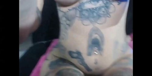 Tattooed Chick fingerfucking herself and loves it