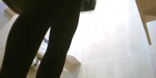 Asian women spied in toilet taking a pee