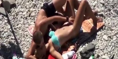 Pussy fingering and handjob at beach