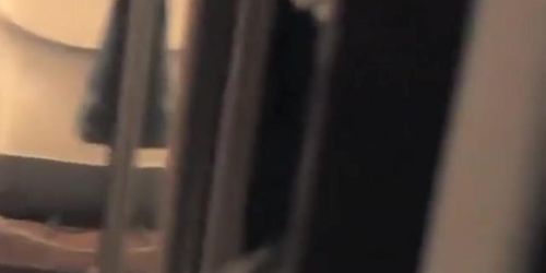 Peeping a horny girl from a window
