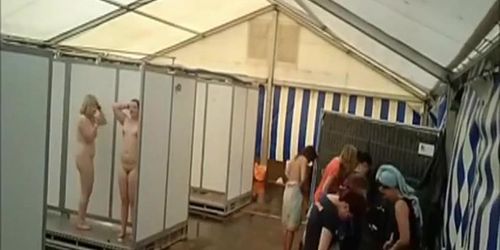 Lots of naked girls in a big public shower